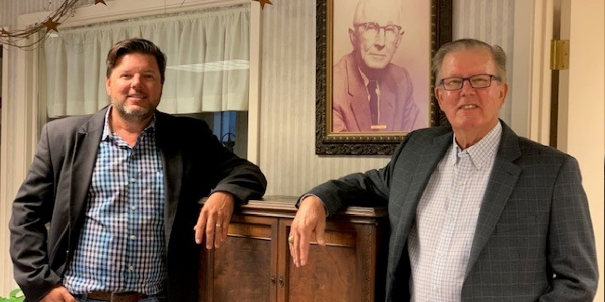 Business man under an umbrella